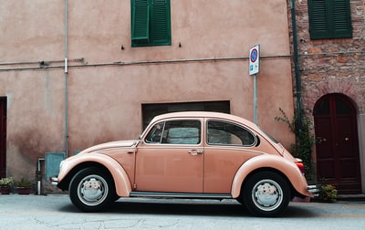 brown Volkswagen Beetle
